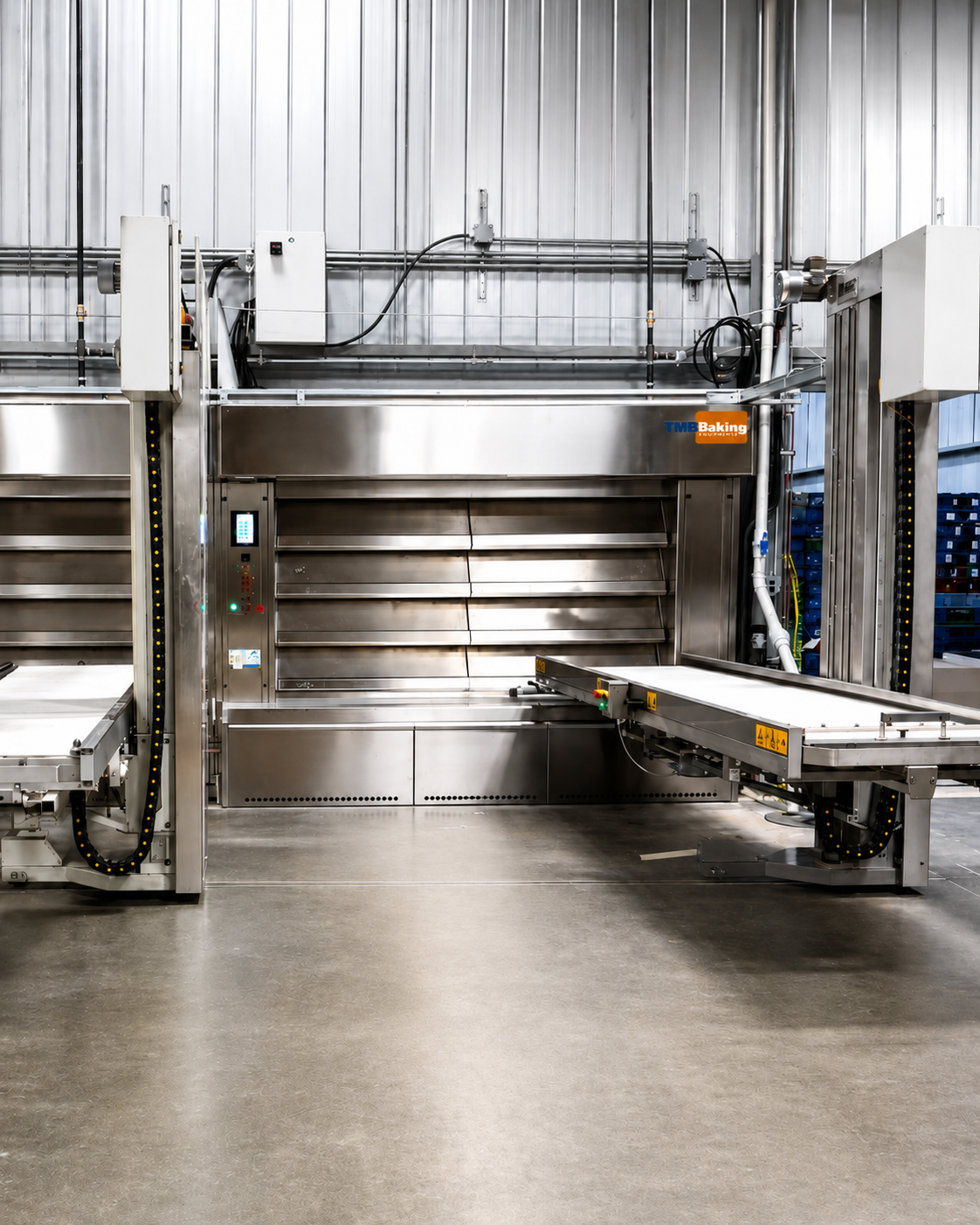 Oven loader setting a full deck of loaves